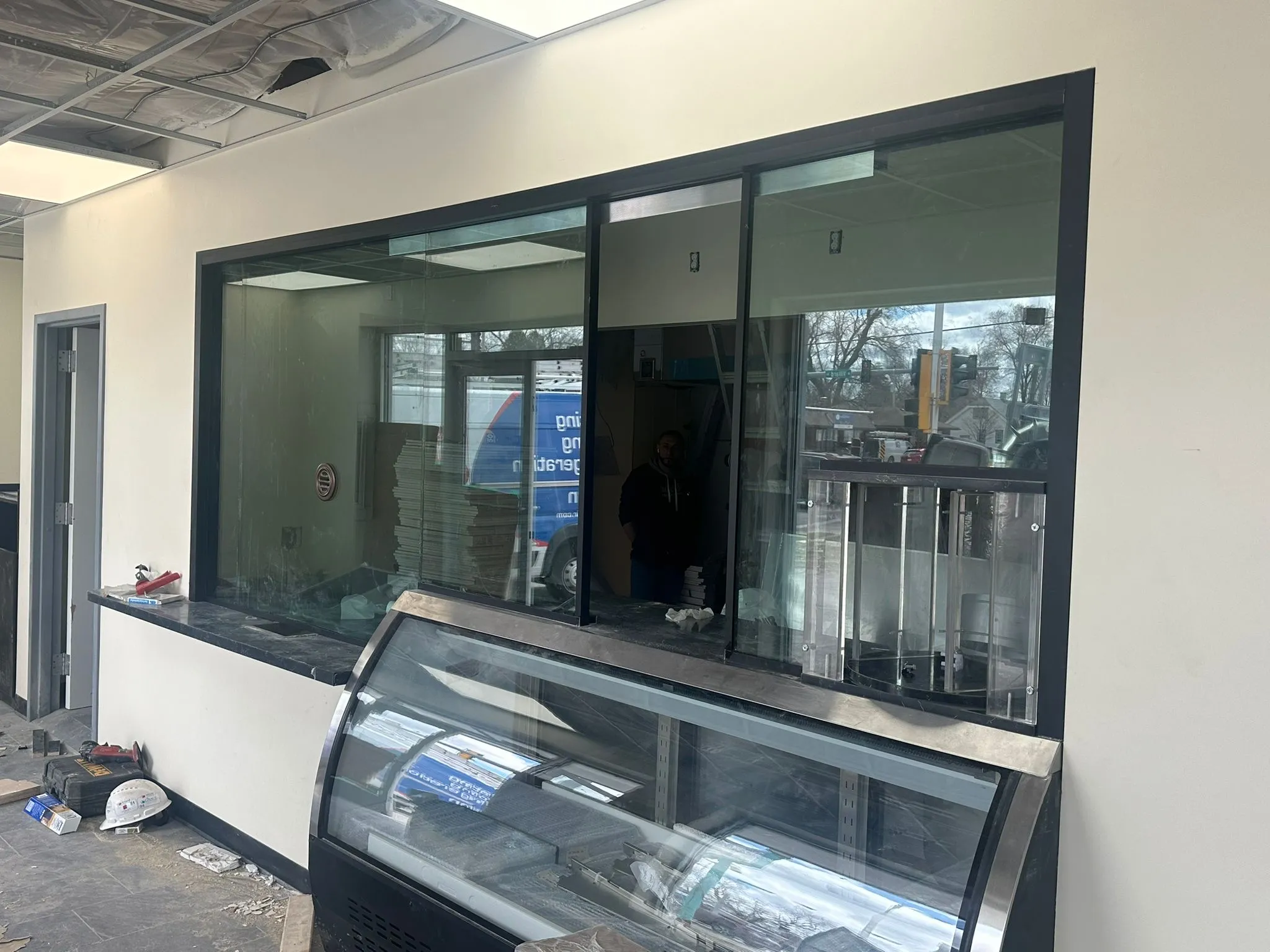 Commercial storefront pass-through glazing during build-out