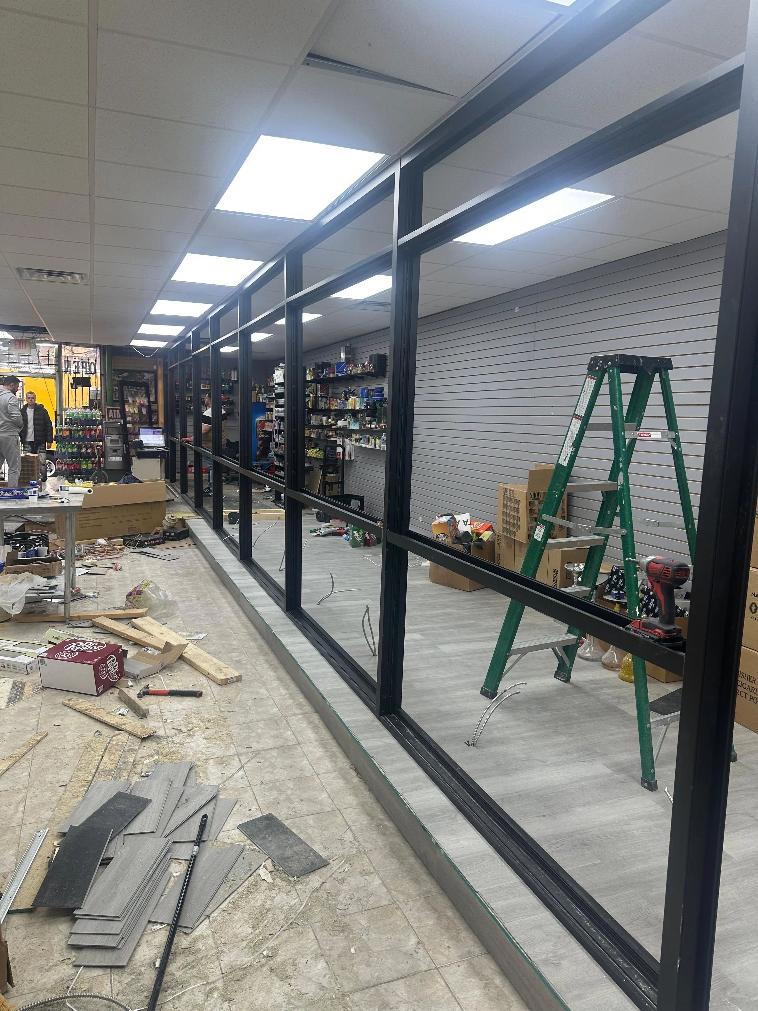 Commercial glass framing installation in progress