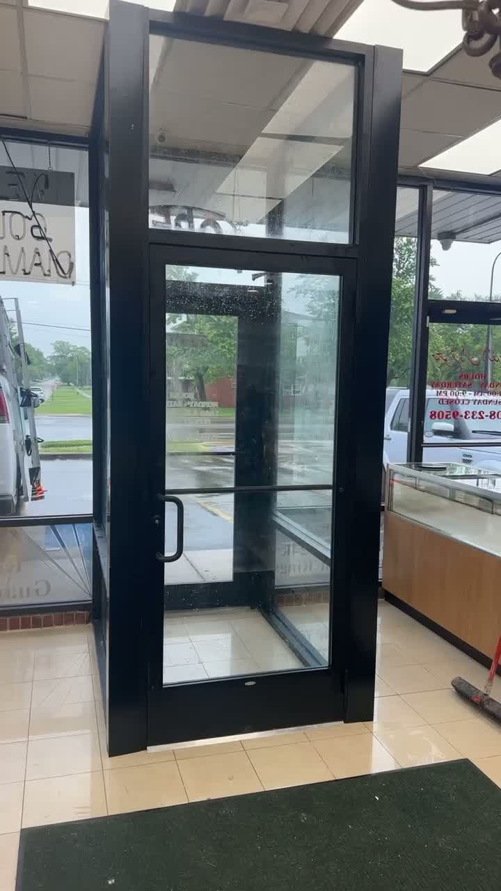 Commercial glass entry door installation