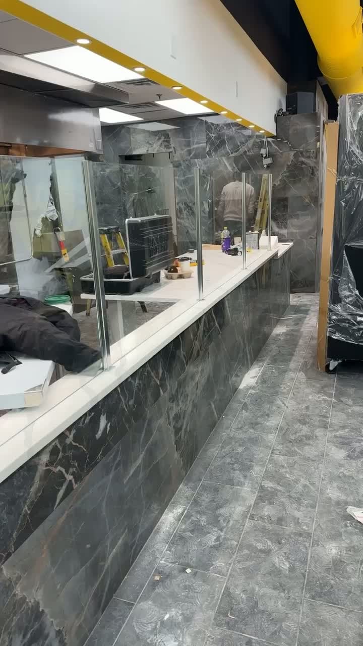 Deli counter glass sneeze-guard installation