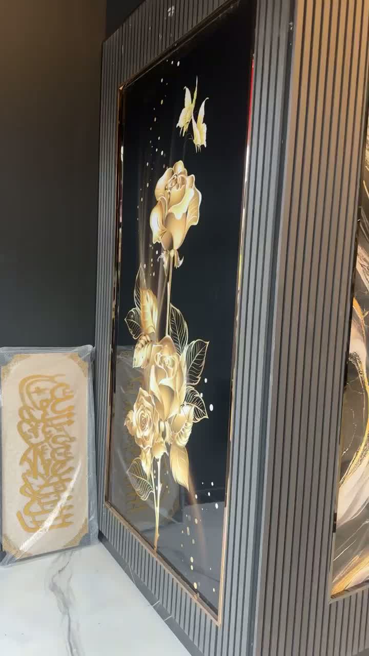 Decorative gold-accented glass panel installation